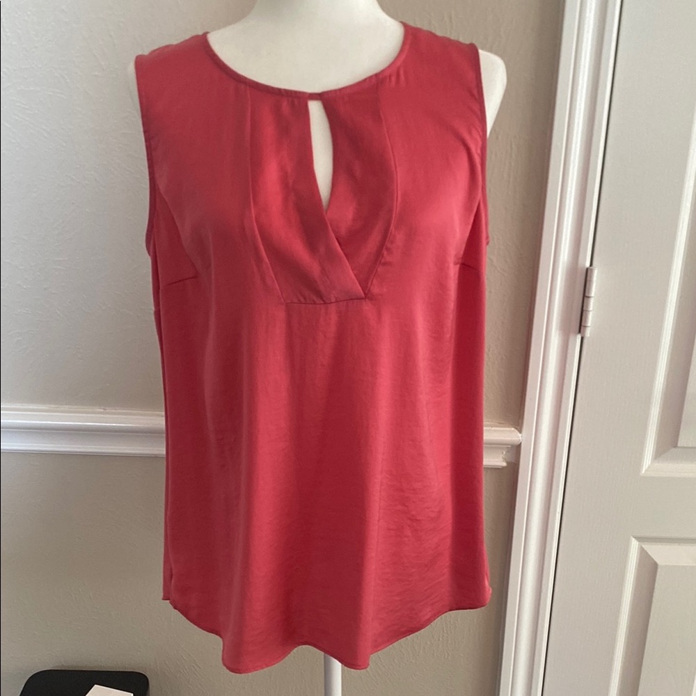Sleeveless Coral cAbi Top. Size M but cAbi clothes run large, would fit size L.